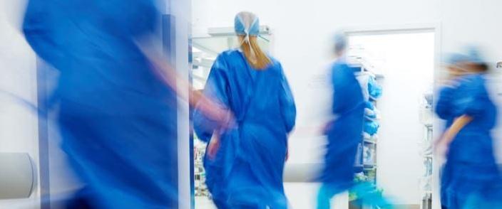 Busy doctors in scrubs